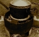 cooking using recycled materials (bike sprocket,empty gas tank turned into stove)